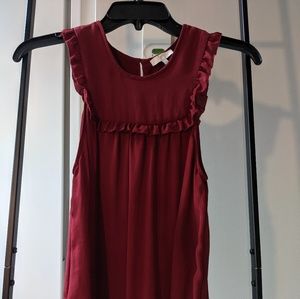Jolie Silk top in burgundy color.